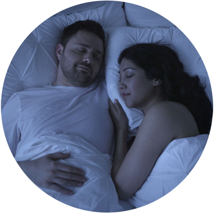 Couple sleeping in bed